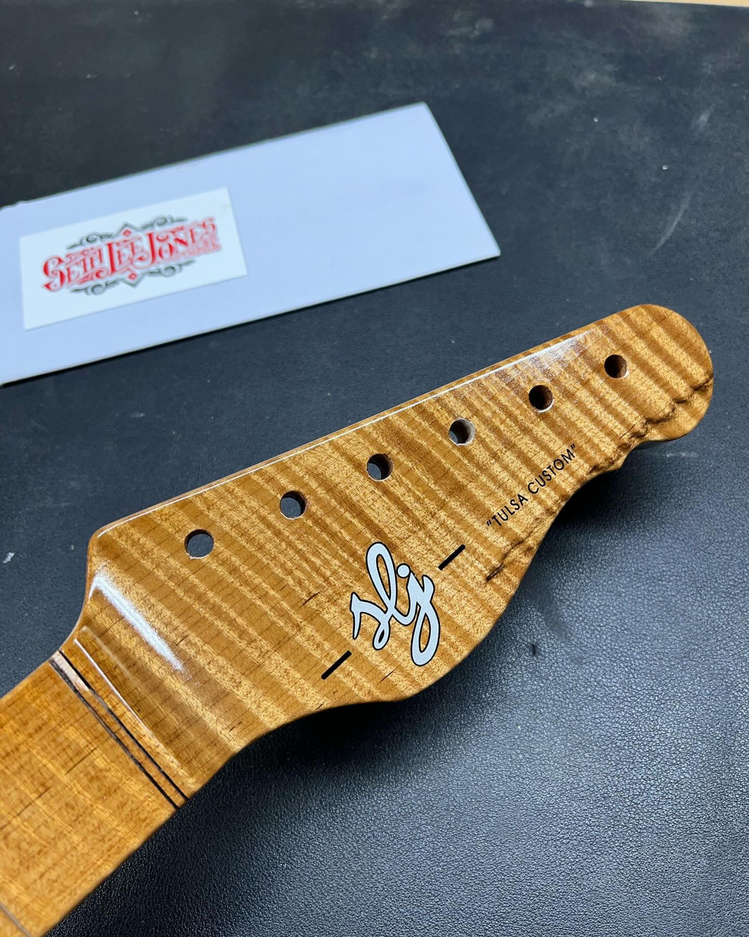 Seth Lee Jones Guitars - workshop custom electric guitar headstock.