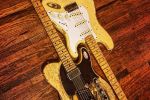 Seth Lee Jones Guitars - two custom electric natural wood, distressed guitars.