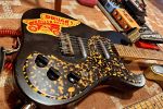 Seth Lee Jones Guitars - black electric guitar with tortoise pickguard and pedals